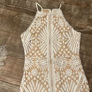 Like New Red Dress Sz Xs form fitted halter style dress. Fully lined.Has stretch